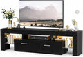 Large TV Stand for TVs up to 75 Inches – Modern Entertainment Center with LED Lights 4 Storage Drawers Open Shelves Black Finish