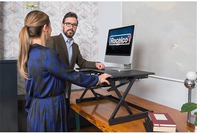 Pemberly Row 38 Height Adjustable Standing Desk Converter Black Finish Metal Construction Large Work Surface Ergonomic Retractable Keyboard Tray Grommet Hole Sit-to-Stand Home Office Desk