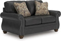 Signature Design by Ashley Chatterton Rustic Faux Leather Loveseat with Nailhead Trim and 2 Throw Pillows Reinforced Frame for Added Stability Reversible Seat Cushions Turned Legs Dark Gray
