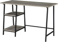 Pemberly Row Trestle Desk 47 in x 20 in x 29.25 in Weathered Gray Particle Board Wood Black Powder Coated Metal Frame Removable Shelves Home Office Workstation Modern Style