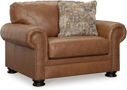 Signature Design by Ashley Carianna Contemporary Leather Match Upholstered Oversized Chair with Nailhead Trim and 1 Accent Pillow Dark Brown