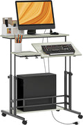 HOMCOM Height Adjustable Standing Desk with Power Outlets Stand Up Desk with Tiltable Tabletop Lockable Wheels Bottom Shelf Rolling Workstation for Home Office Oak