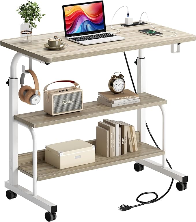 soges Height Adjustable Desk with Charging Station Mobile Computer Workstation with 2 Storage Shelves Small Rolling Desk on Wheels for Home Office Maple