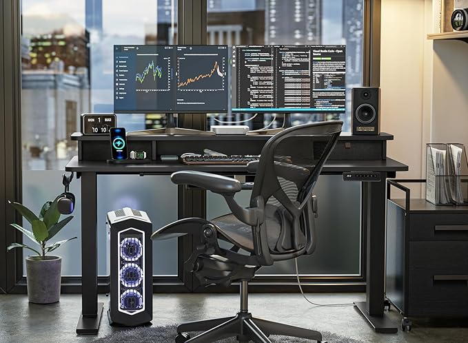 FEZIBO 63 x 28 Inch Deeper Height Adjustable Electric Standing Desk with Double Drawers Sit Stand Up Home Office Computer Desk with 4 Height-Adjustable Feets &amp 2 Hooks Black Frame/Black Top