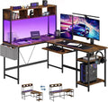 DUMOS L Shaped Gaming Desk 67” Reversible Computer Desks with Led Lights Corner Table with Keyboard Tray Side Bag Storage Shelf Metal Frame Wood Writing for Home Office Bedroom Brown