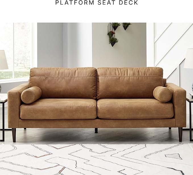 Signature Design by Ashley Telora Faux Leather Sofa 2 Bolster Pillows Loose Cushions Faux Wood Finish Accent Legs 85 W x 35 D x 35 H Dark Brown