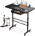 GTPLAYER Small Mobile Standing Desk 32In Wide Adjustable Height Stand Up Desk for Home Office Portable Sit Stand Rolling Computer Desk with Wheels Storage Drawer and Slot Carbon Fiber Style Black