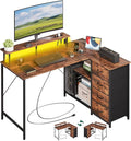 Somdot 53 L Shaped Desk with 4 DrawersHome Office Desks with Power OutletsGaming Desk with USB Charging Port and Host Stand Corner Desk with Storage Shelves for GamingWood Grain Print