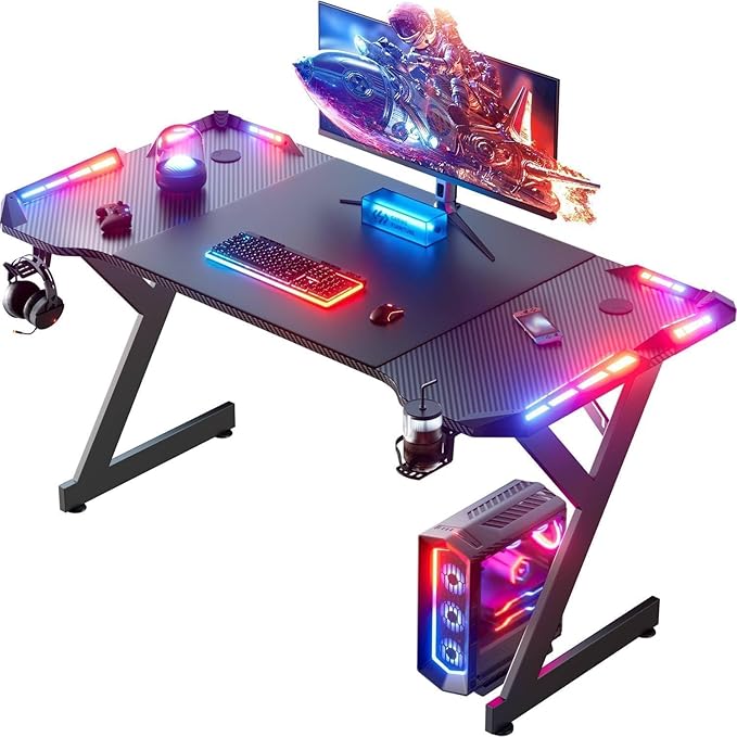HLDIRECT 47 Inch Gaming Desk with LED Lights Ergonomic Computer Gaming Table with Carbon Fibre Surface Sturdy PC Workstation Desk for Home Office with Headphone Hook Cup Holder Black