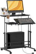 HOMCOM Height Adjustable Standing Desk with Power Outlets Stand Up Desk with Tiltable Tabletop Lockable Wheels Bottom Shelf Rolling Workstation for Home Office Black