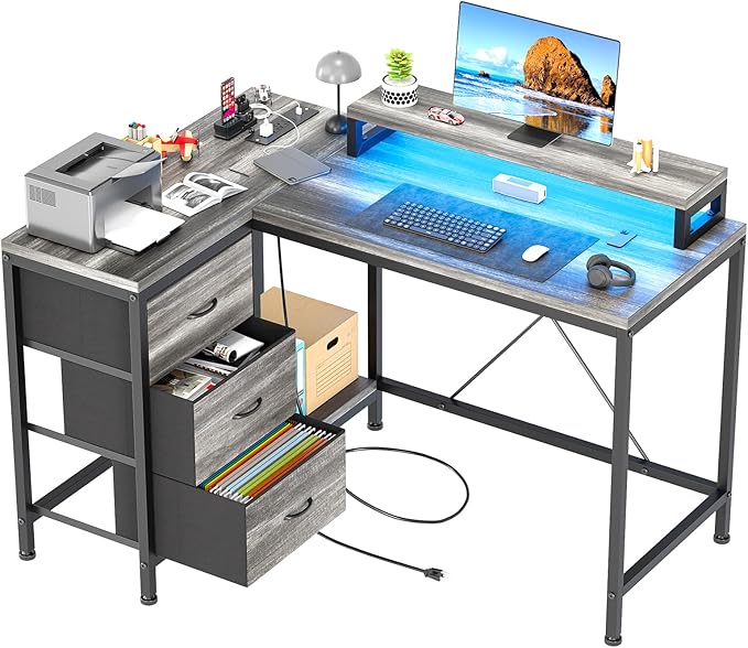 Hetoy L-Shaped Computer Desk with Charging Station – Corner Gaming Desk with LED Lights Drawers &amp Storage Shelves for Home Office Use Oak