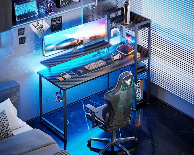 ODK Reversible Gaming Desk with Power Outlets and LED Lights 48 Inch Computer Desk with Storage Shelves and Monitor Stand Modern Writing Study Desk for Home Office Carbon Fiber Black