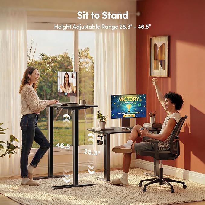 FEZIBO 40 x 24 Inchs Electric Standing Desk Height Adjustable Sit Stand Up Computer Office Desk with Splice Board Black Frame/Black Top