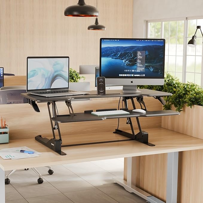 Mount-It! 47 Standing Desk Converter XL Desktop Sit-Stand Desk Riser with Gas Spring Height Adjustment Wide Desk Topper for Dual Monitors or Monitor &amp Laptop Keyboard Tray Black