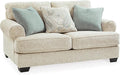 Signature Design by Ashley Monaghan Vintage Loveseat with Accent Pillows Reversible Cushions and Rolled Arms Beige
