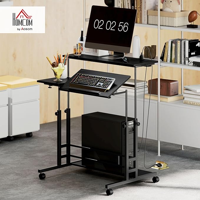 HOMCOM Height Adjustable Standing Desk with Power Outlets Stand Up Desk with Tiltable Tabletop Lockable Wheels Bottom Shelf Rolling Workstation for Home Office Black