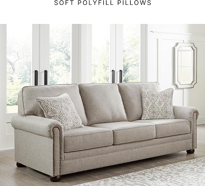 Signature Design by Ashley Gaelon Transitional Sofa with Nailheads and 2 Accent Pillows Beige