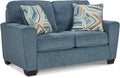 Signature Design by Ashley Cashton Contemporary Loveseat Exposed Feed With Faux Wood Finish Accent Pillows Fabric Upholstery 63 W x 38 D x 39 H Blue