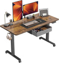 CubiCubi 63 x 24 Inch Standing Desk with Drawer Electric Stand up Adjustable Height Electric Stand up Desk Sit Stand Home Office Desk Ergonomic Workstation Black Steel Frame/Rustic Brown Tabletop