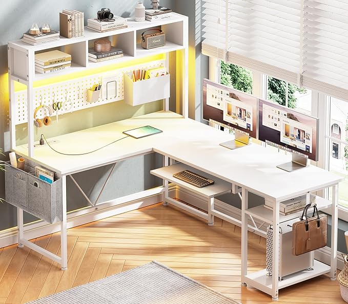 SEDETA White L Shaped Office Desk 57.5” Corner Computer Desk with Power Outlet Pegboard and Keyboard Tray Gaming Table with LED Lights Hutch and Storage Shelves for Home Office