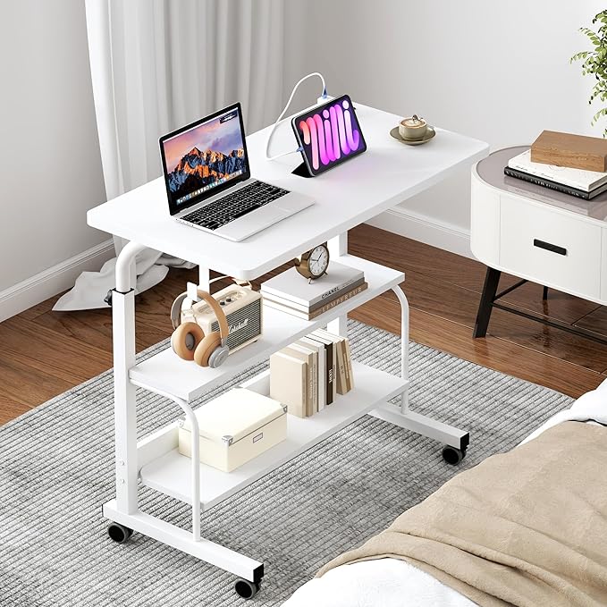 soges Height Adjustable Desk with Charging Station Mobile Computer Workstation with 2 Storage Shelves Small Rolling Desk on Wheels for Home Office White