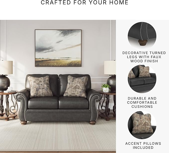 Signature Design by Ashley Chatterton Rustic Faux Leather Loveseat with Nailhead Trim and 2 Throw Pillows Reinforced Frame for Added Stability Reversible Seat Cushions Turned Legs Dark Gray