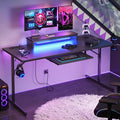 Bestier 63 Inch Gaming Desk with Power Outlets &amp LED Lights Large Computer Desk with Monitor Stand &amp Keyboard Tray Home Office Table with Cup Holder &amp Headset Hook Carbon Fiber Black