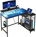 42 L Shaped Desk with LED Lights Power Outlet USB Charging Ports Reversible L Shaped Computer Desk with Storage Shelves Monitor Stand Corner Gaming Desk for Home Office Black