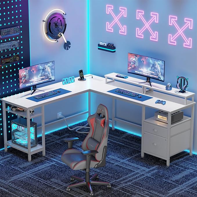 Furologee 66” L Shaped Desk with Power Outlet Reversible Computer Gaming Desk with File Drawer &amp 2 Monitor Stands for Home Office with Storage Shelves White