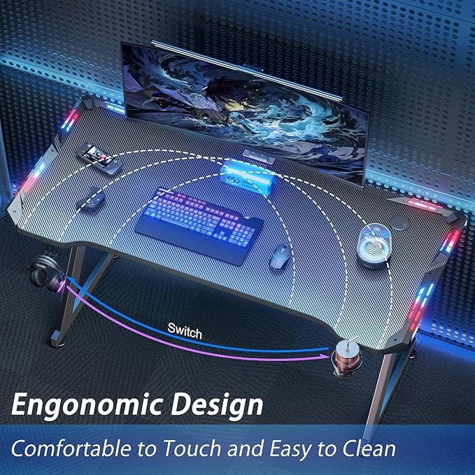 HLDIRECT 55 Inch Gaming Desk with LED Lights Ergonomic Computer Gaming Table with Carbon Fibre Surface Sturdy PC Workstation Desk for Home Office with Headphone Hook Cup Holder Black