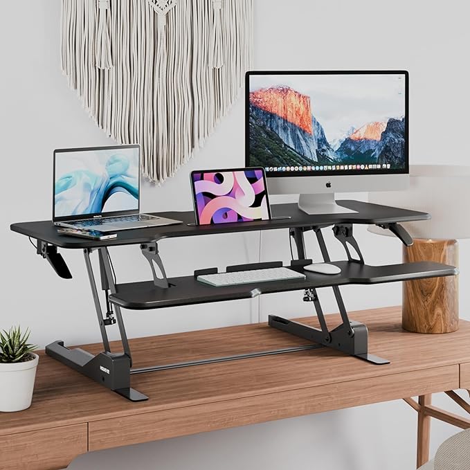 Mount-It! 47 Standing Desk Converter XL Desktop Sit-Stand Desk Riser with Gas Spring Height Adjustment Wide Desk Topper for Dual Monitors or Monitor &amp Laptop Keyboard Tray Black