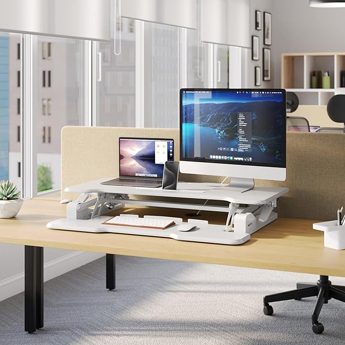 Mount-It! Standing Desk Converter White 38” Wide Height Adjustable Stand Up Desk Riser Desk Topper with Gas Spring Desktop Standing Desk with Keyboard Tray Fits Two Monitors