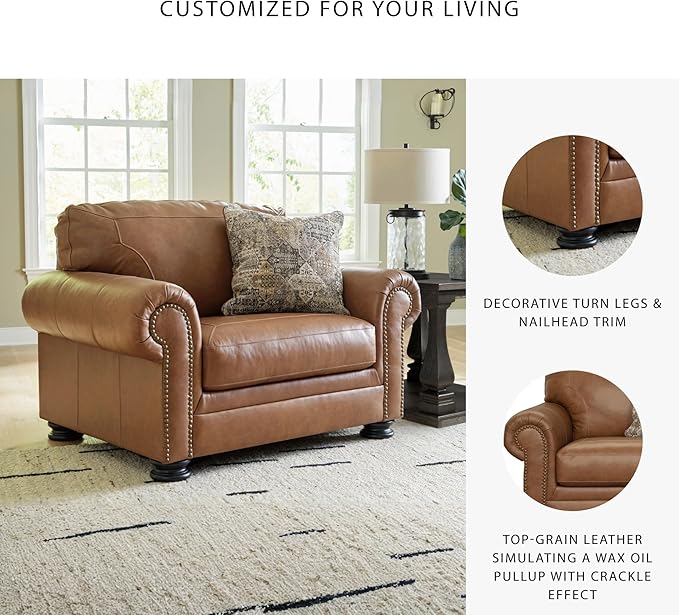 Signature Design by Ashley Carianna Contemporary Leather Match Upholstered Oversized Chair with Nailhead Trim and 1 Accent Pillow Dark Brown
