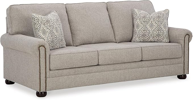 Signature Design by Ashley Gaelon Transitional Sofa with Nailheads and 2 Accent Pillows Beige