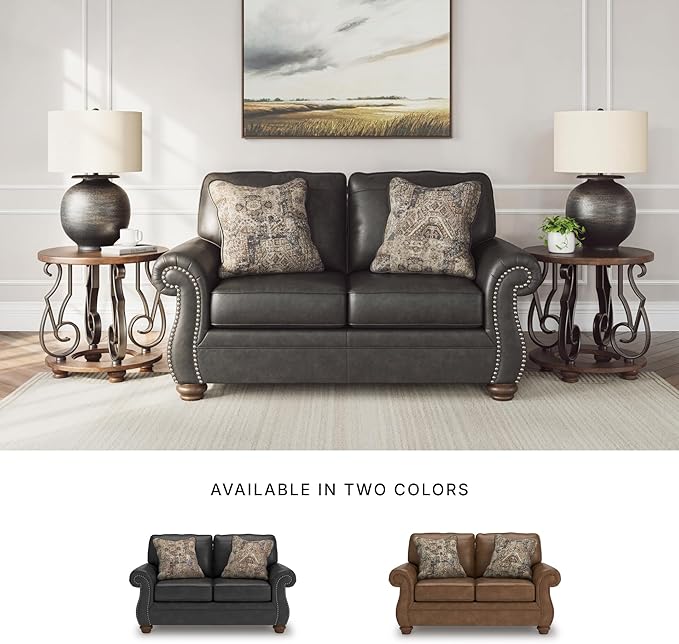 Signature Design by Ashley Chatterton Rustic Faux Leather Loveseat with Nailhead Trim and 2 Throw Pillows Reinforced Frame for Added Stability Reversible Seat Cushions Turned Legs Dark Gray