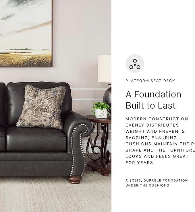 Signature Design by Ashley Chatterton Rustic Faux Leather Loveseat with Nailhead Trim and 2 Throw Pillows Reinforced Frame for Added Stability Reversible Seat Cushions Turned Legs Dark Gray