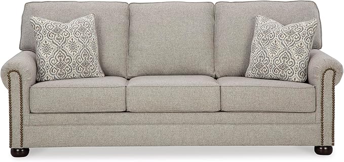 Signature Design by Ashley Gaelon Transitional Sofa with Nailheads and 2 Accent Pillows Beige