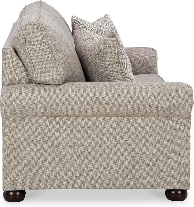 Signature Design by Ashley Gaelon Transitional Sofa with Nailheads and 2 Accent Pillows Beige