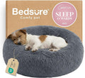 Bedsure Calming Dog Bed for Small Medium Dogs - Donut Washable Medium Pet Bed 27 inches Anti-Slip Round Fluffy Plush Faux Fur Cat Bed Dark Grey