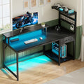 EnHomee 48 Gaming Desk with LED Lights &amp Power Outlets Home Office Desk with Monitor Stand Computer Desk with Drawer &amp Storage Shelves for Living Room Study Room Gaming Room Black